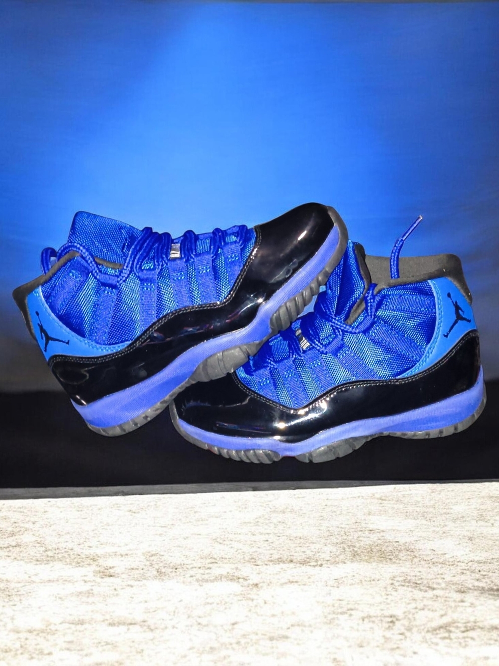 Jordan Retro 11 Sneakers in Royal Blue and Black